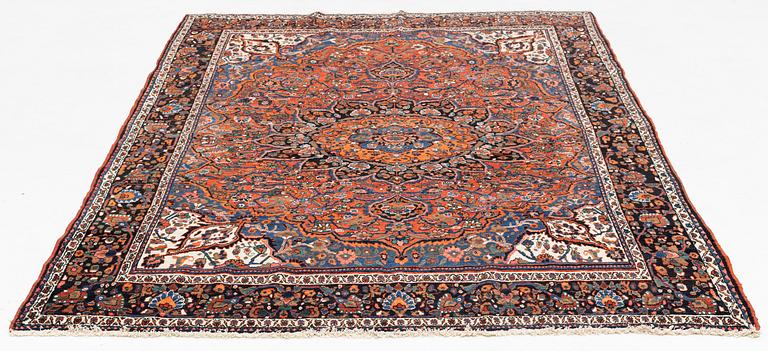 A semi-antique Abadeh carpet, approximately 296 x 191-196 cm.