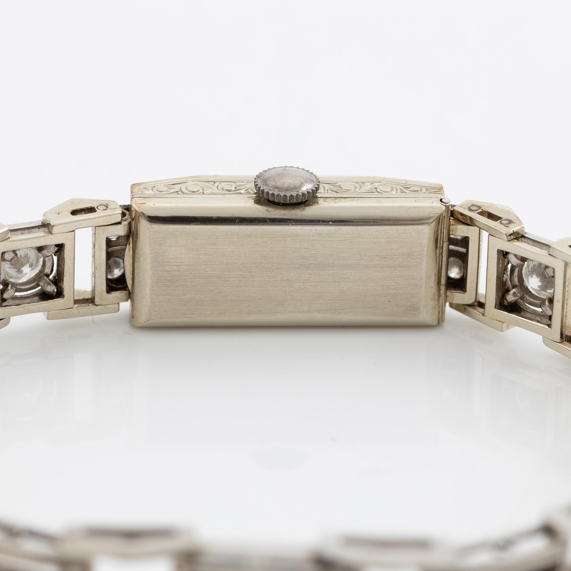 Armbandsur, art déco, länk 18K vitguld med briljantslipade och gammalslipade diamanter, K& KC Göteborg 1941.