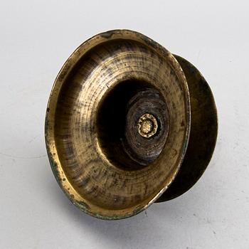 A BAROQUE BRASS CANDLESTICK, 18th century.