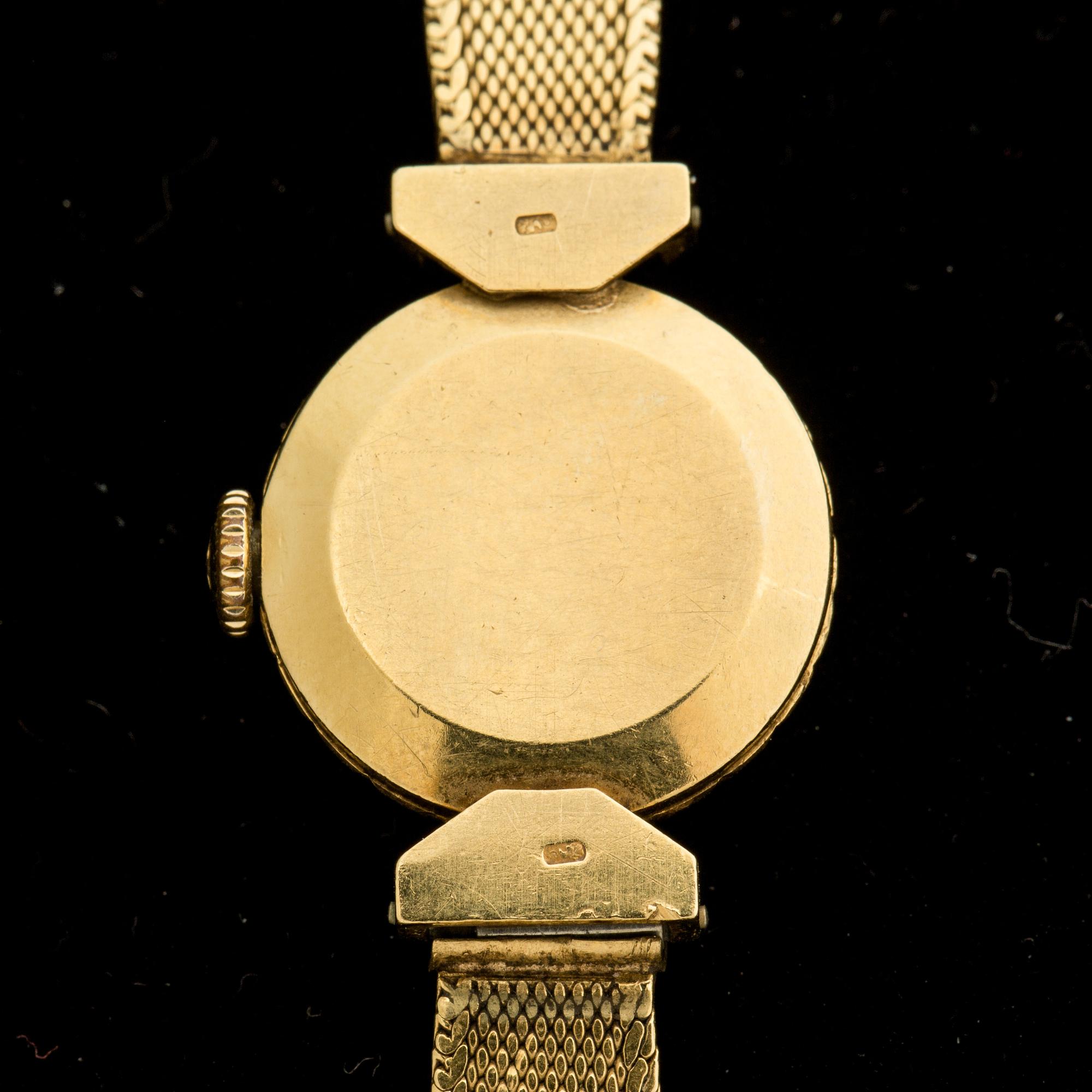 DAMARMBANDSUR, delvis 18K guld. Tissot. Vikt totalt ca 20 gram.