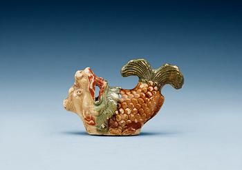 1800. A glazed pottery dragon-carp water dropper, Qing dynasty, Jiaqing, circa 1816.