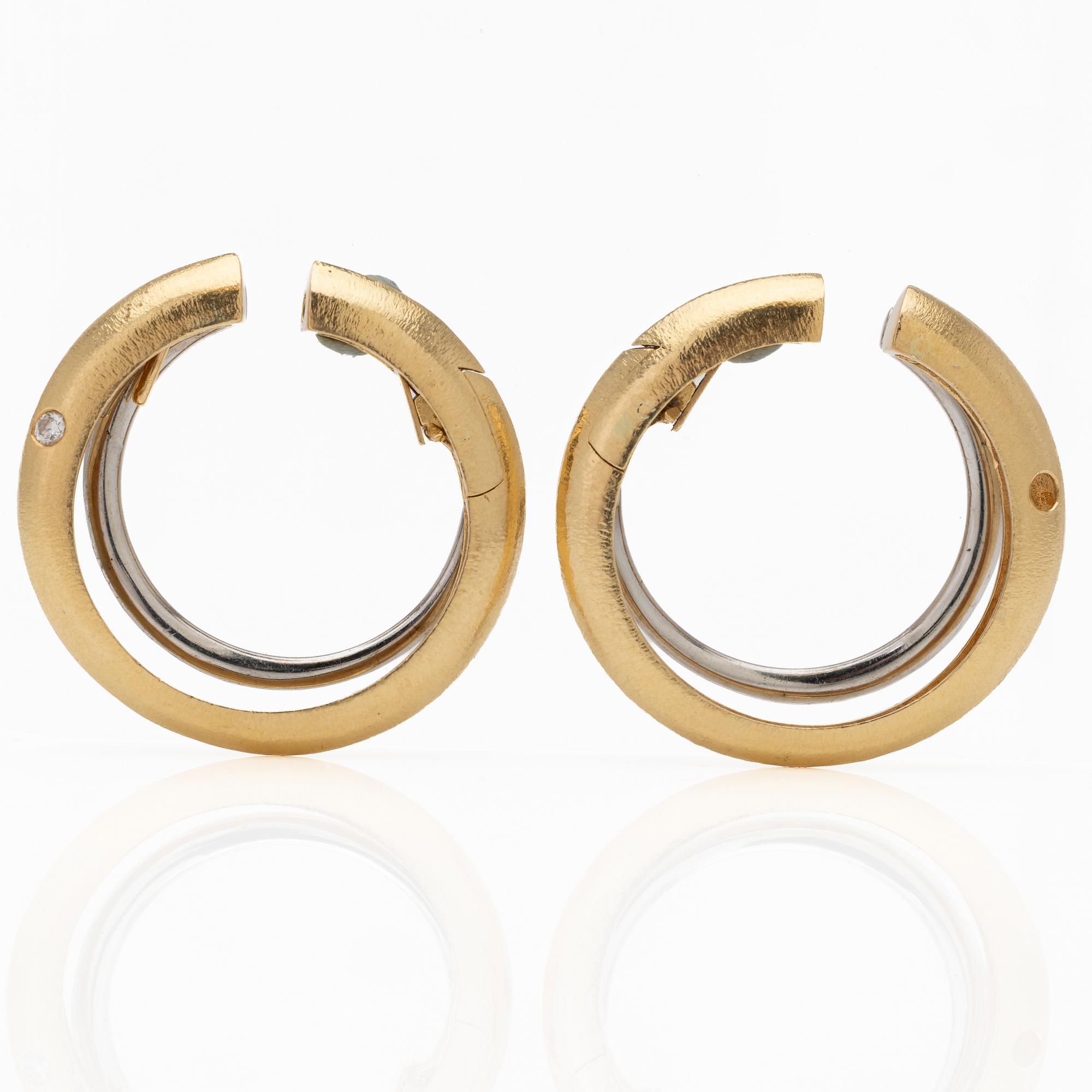 Ole Lynggaard, 18K gold and diamond hoop earrings.