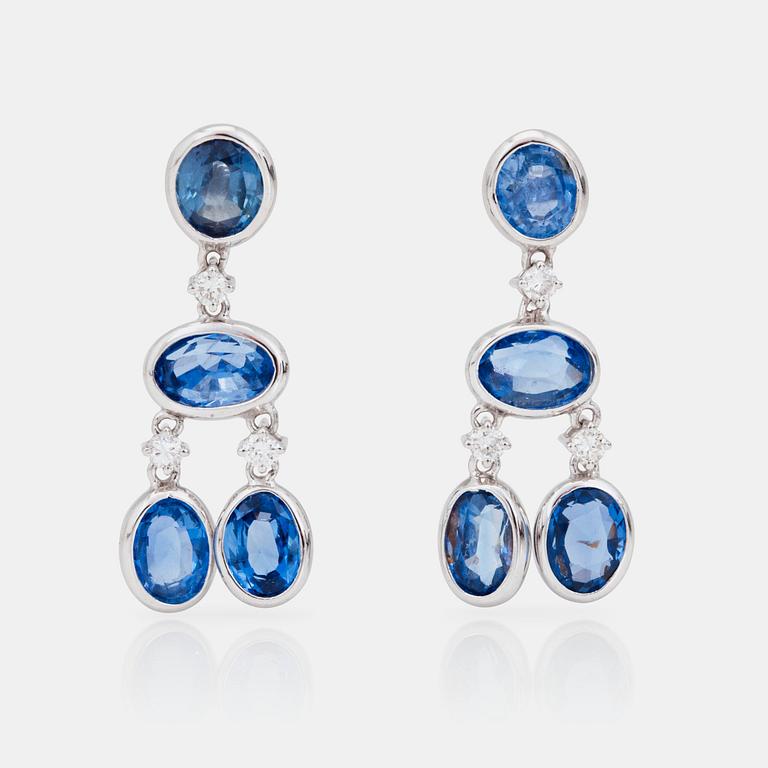 A pair of unheated sapphire and brilliant-cut diamond earrings. Certificate from GCS.