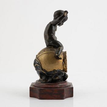 A bronze and marble figural timepiece, later part 18th century.