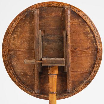 A tilt top table, from around the year 1800.