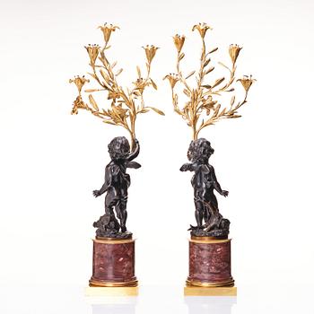A pair of Louis XV/ Louis XVI five-light candelabra, second part of the 18th century.