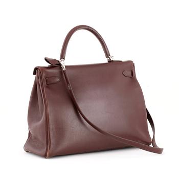 HERMÈS, a brown leather handbag, "Kelly 35".