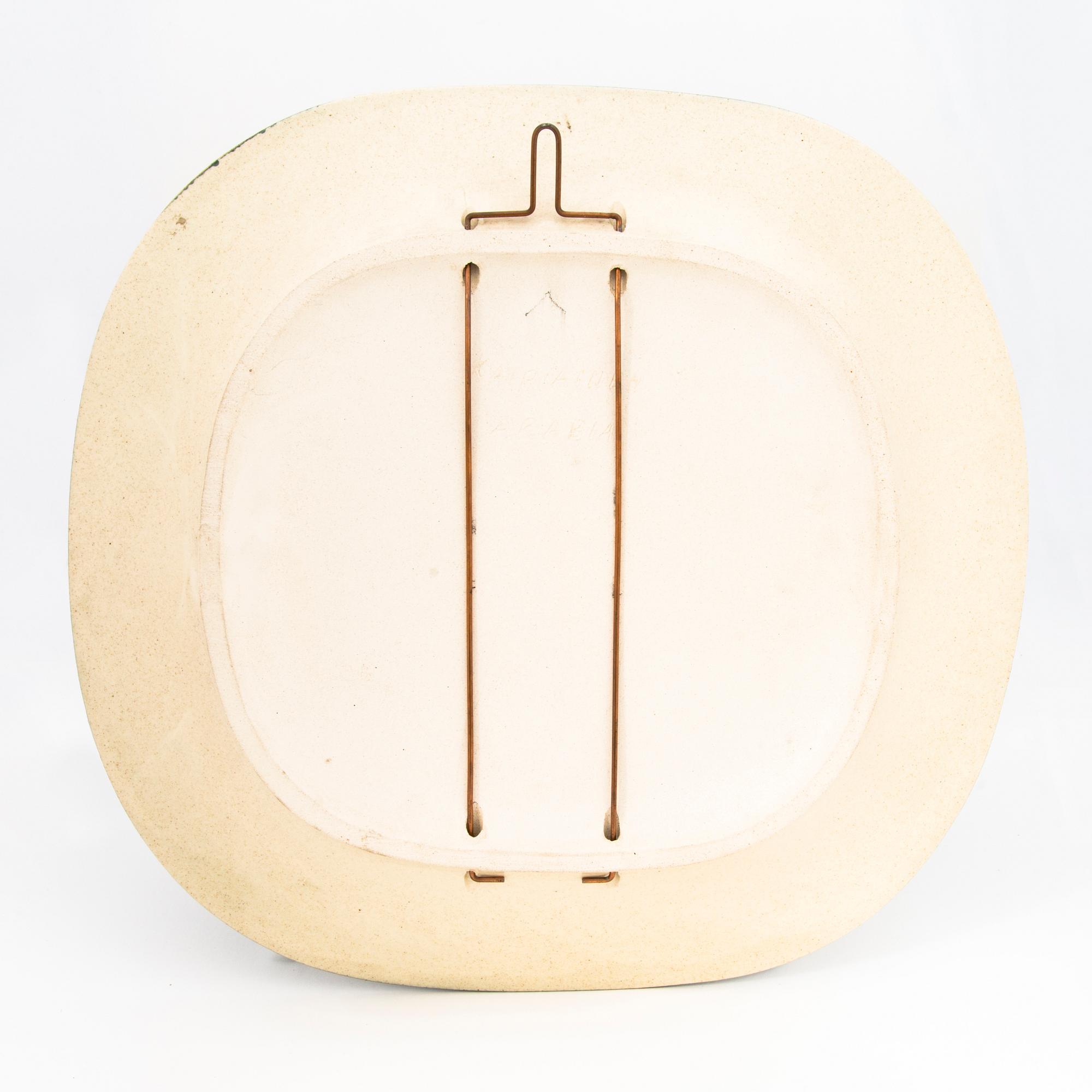 BIRGER KAIPIAINEN, a stoneware decorative dish signed Kaipiainen Arabia.