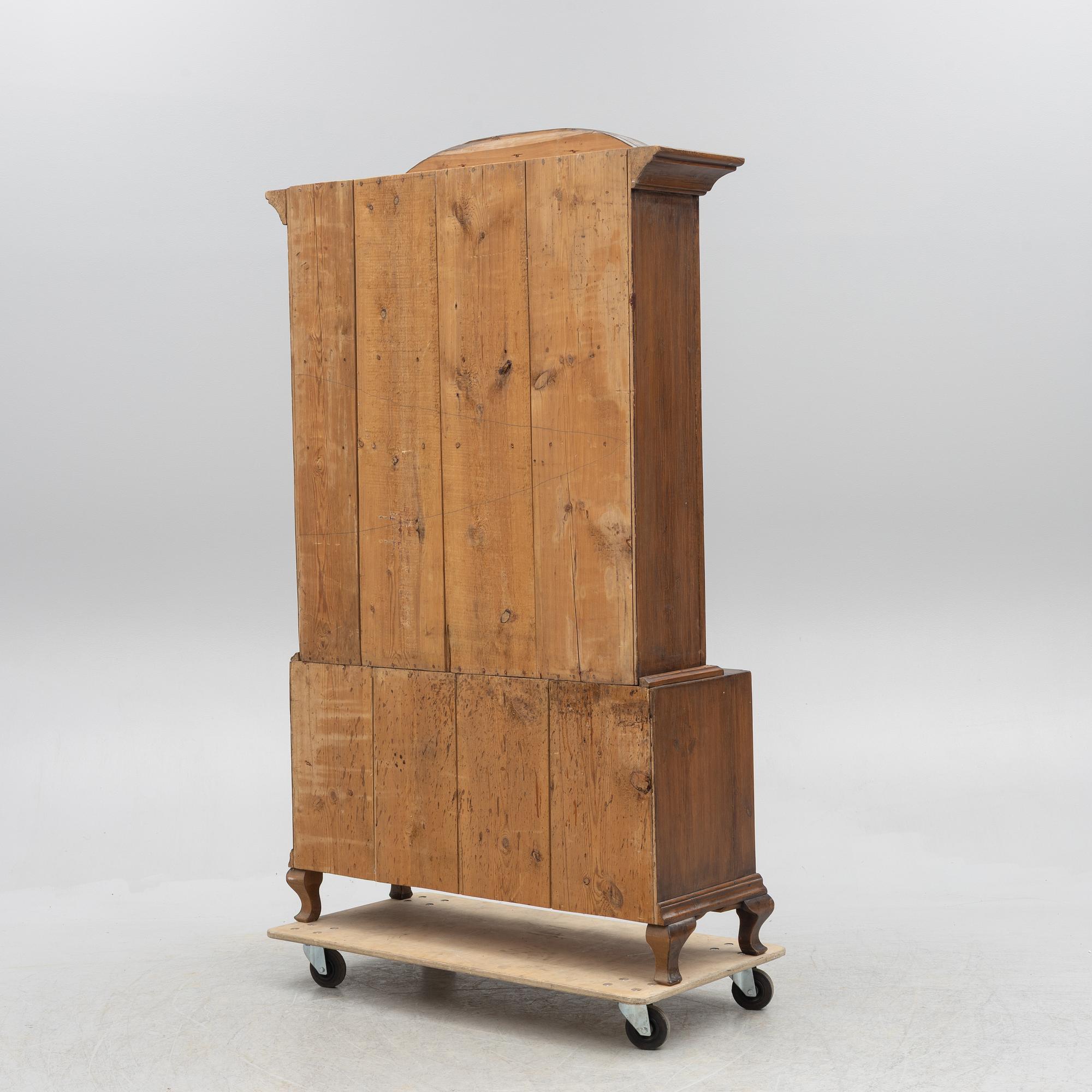 A display cabinet, 18th Century.