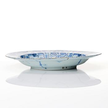 A large Dutch Delft faience charger, late 17th Century.