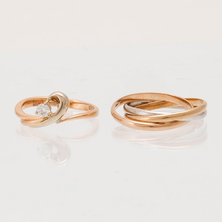 Rings, 2 pcs, 14K gold and round brilliant-cut diamond.