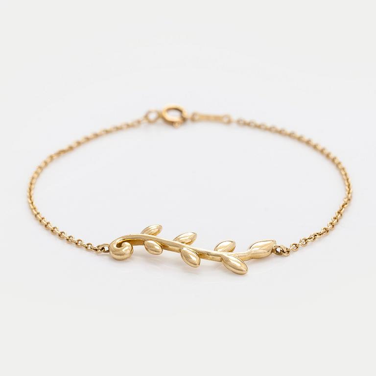 Tiffany & Co, Paloma Picasso, an 18K gold "Olive Leaf" bracelet.