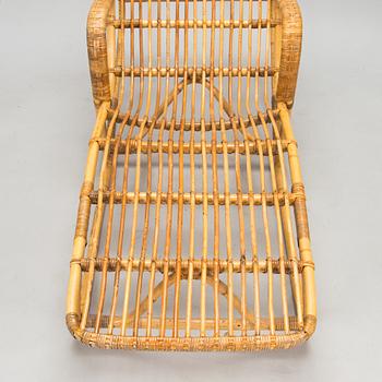 A rattan lounger, mid-20th century.