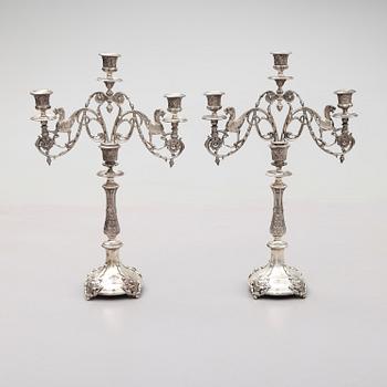 KANDELABRAR, 1 par, nysilver, omkring år 1900.