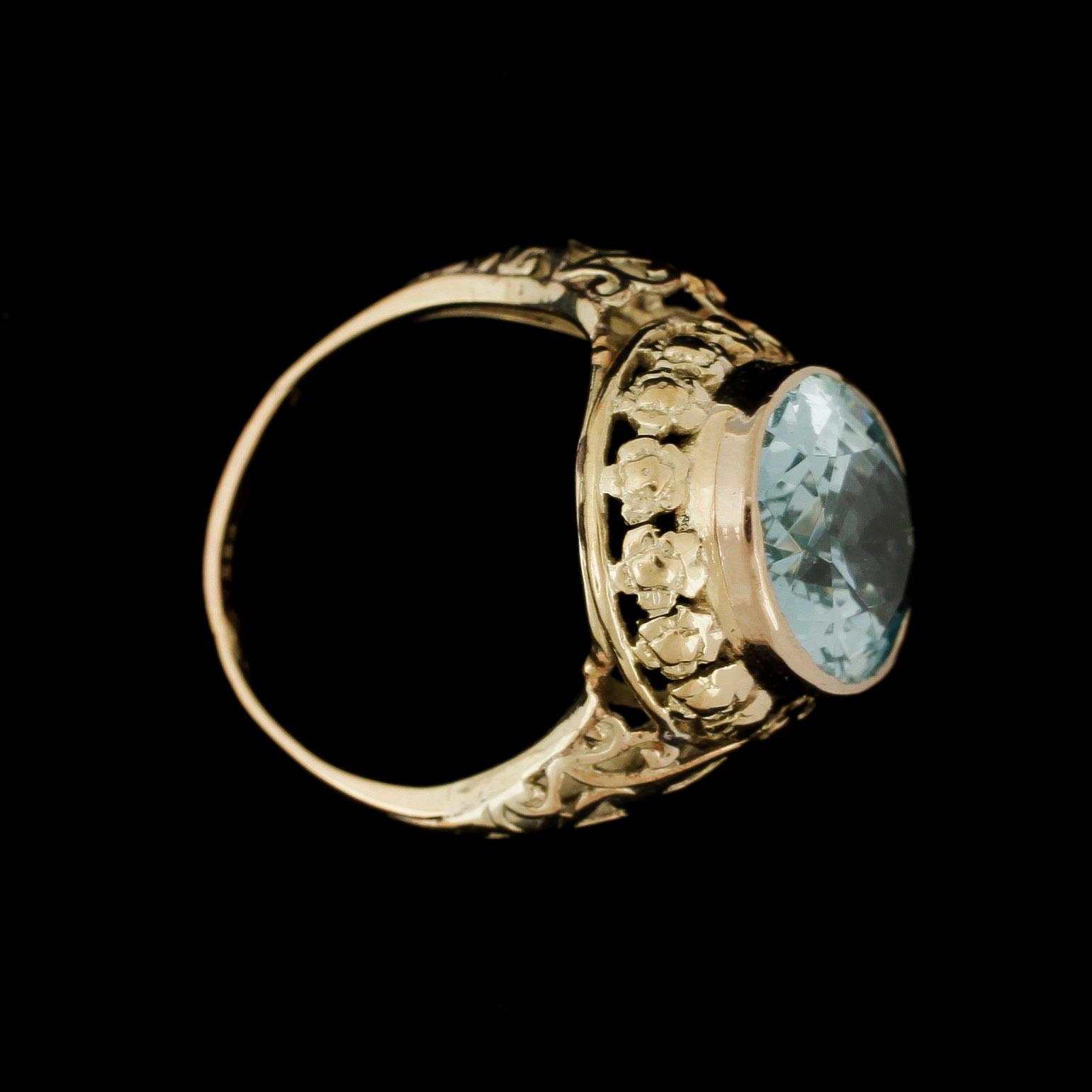 RING, 14k guld med blågrön troligen spinell, omkring 1900. Vikt 5,1g.