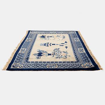 A Carpet, old China, "antique finish" ca 197 x 133 cm.