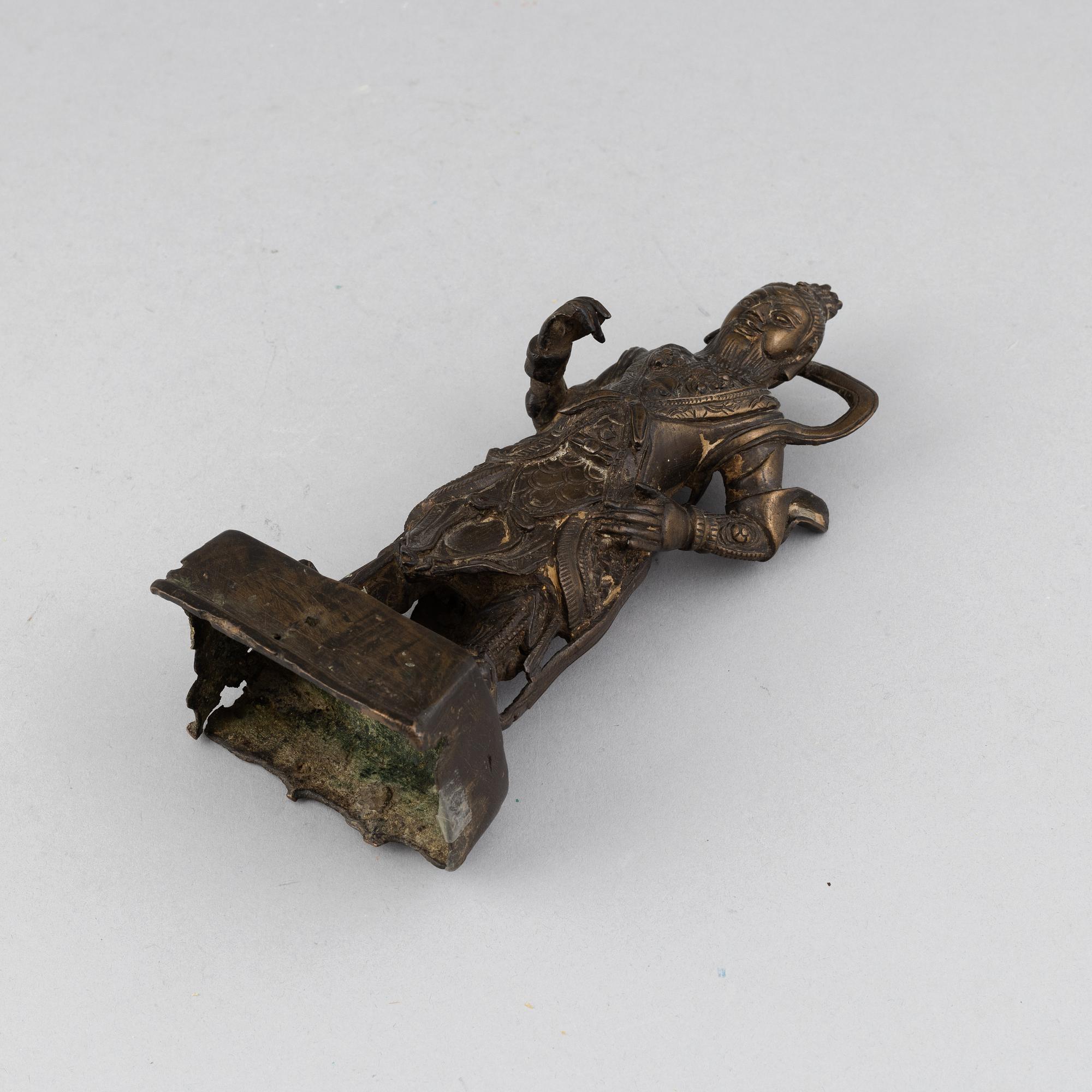 A bronze sculpture of a warrior, Qing dynasty.