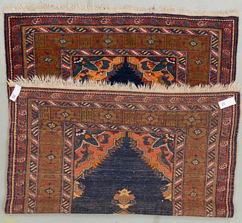 An oriental rug, probably Caucasian. Around 199 x 137 cm.