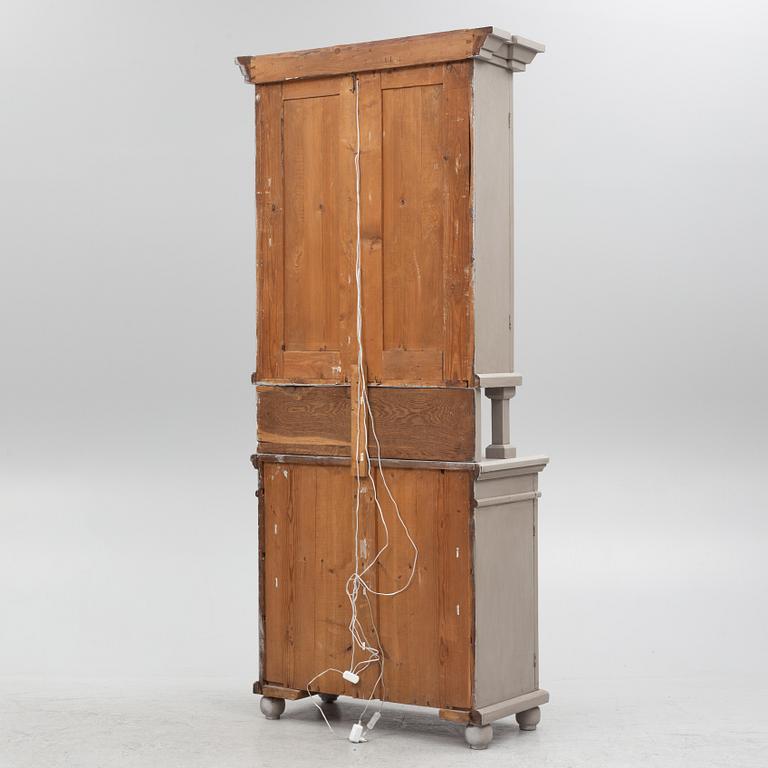 A two-part cabinet, around 1900.