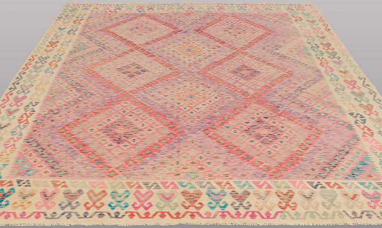 A CARPET, Kilim, ca 292 x 265 cm.