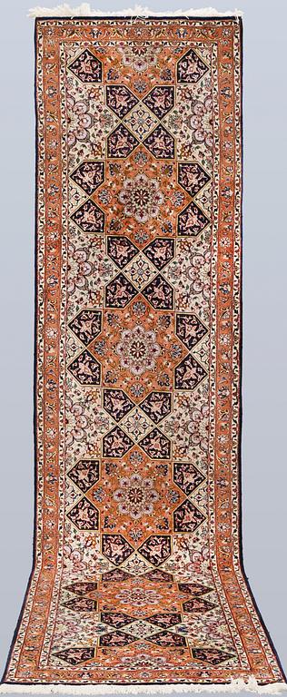 A part silk Tabriz runner, so called 50 Raj, approx. 300 x 77 cm.