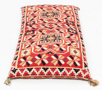 A carrige cushion, flat weave, 120 x 50 cm Scania, mid 19th century.