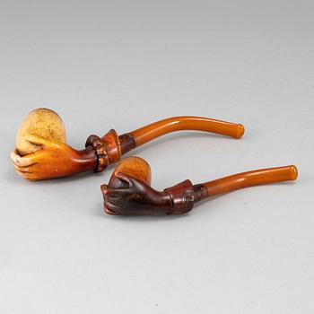 Two 19th century smoking pipes.