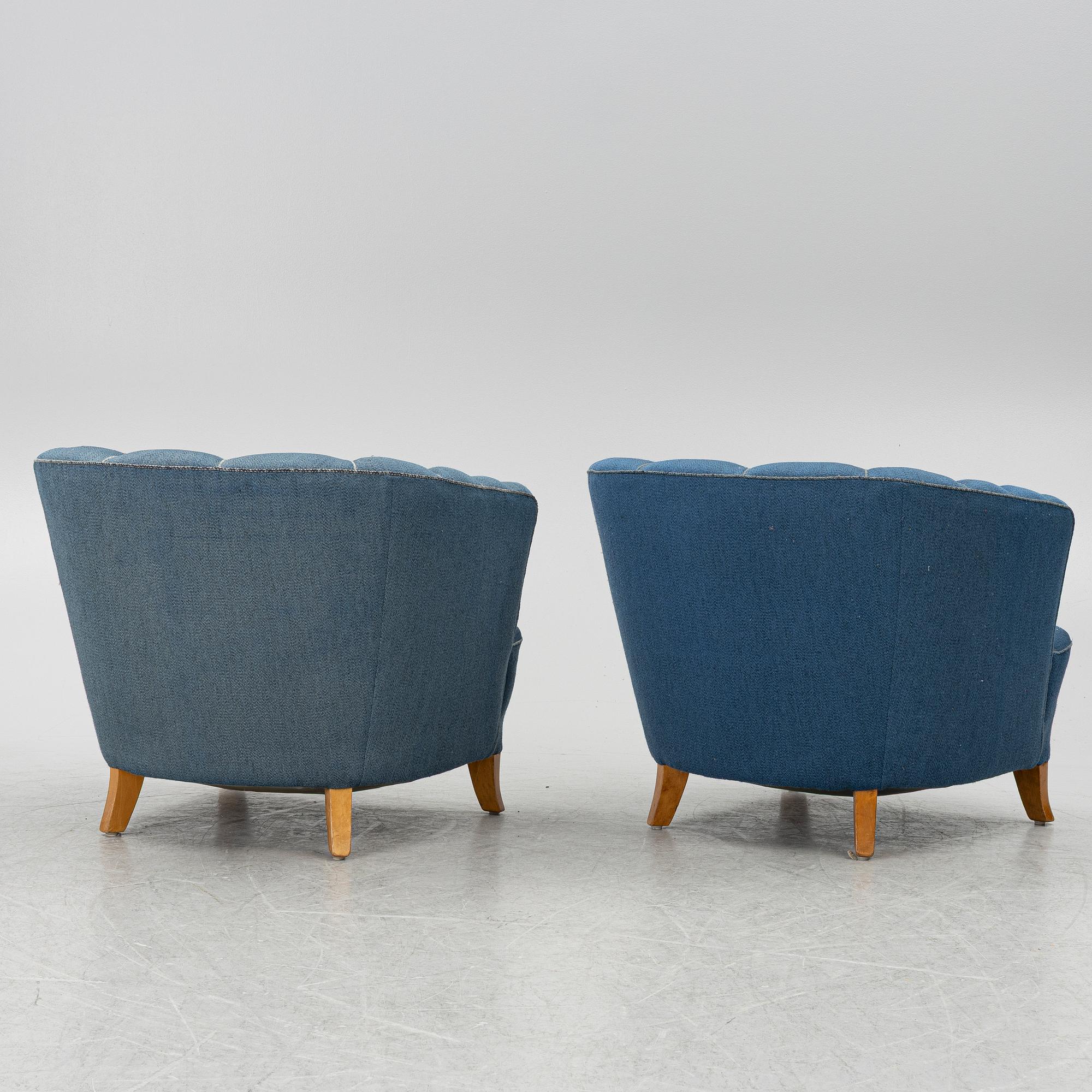 A pair of 1950's armchairs.