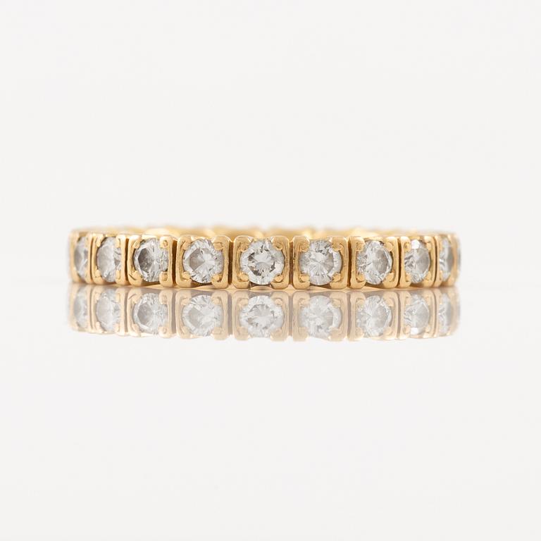 Ring in 18K gold set with round brilliant-cut diamonds, eternity band.