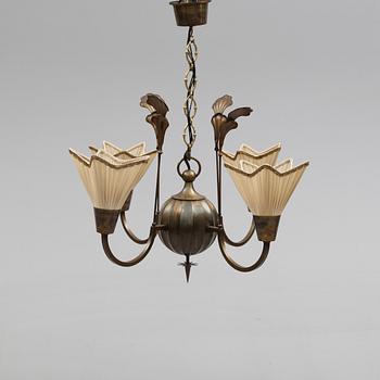 TAKKRONA, art déco, 1900-talets första hälft. Höjd ca 46 cm.