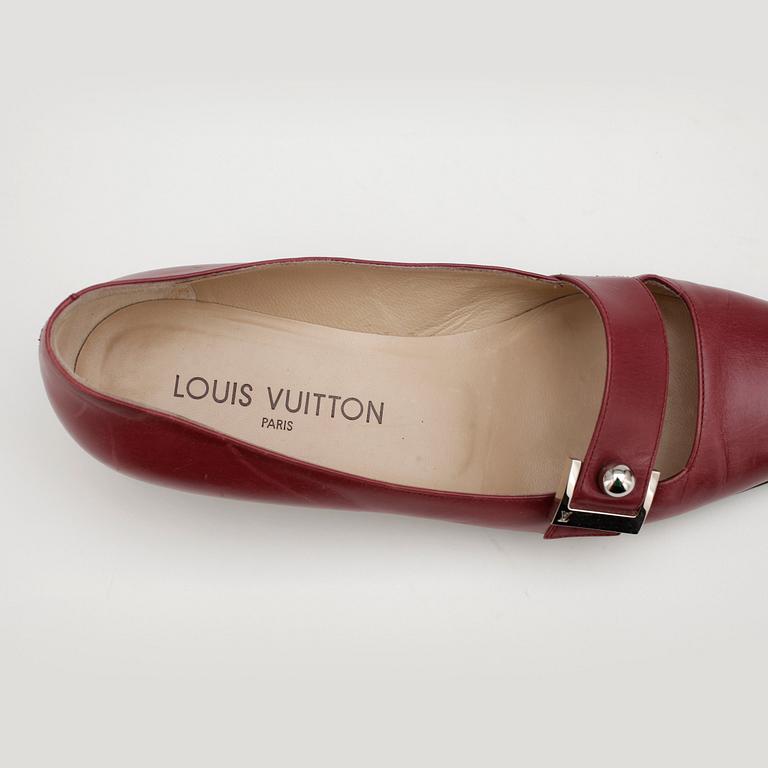 LOUIS VUITTON, a pair of red leather shoes.