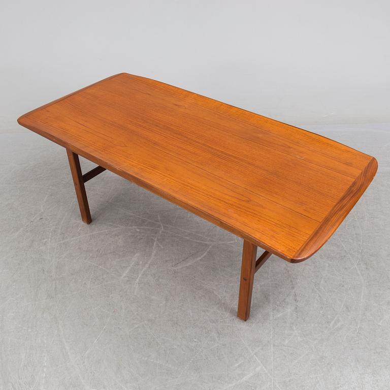 a late 20th century teak table.