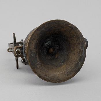 An 18th century bronze oil lamp.