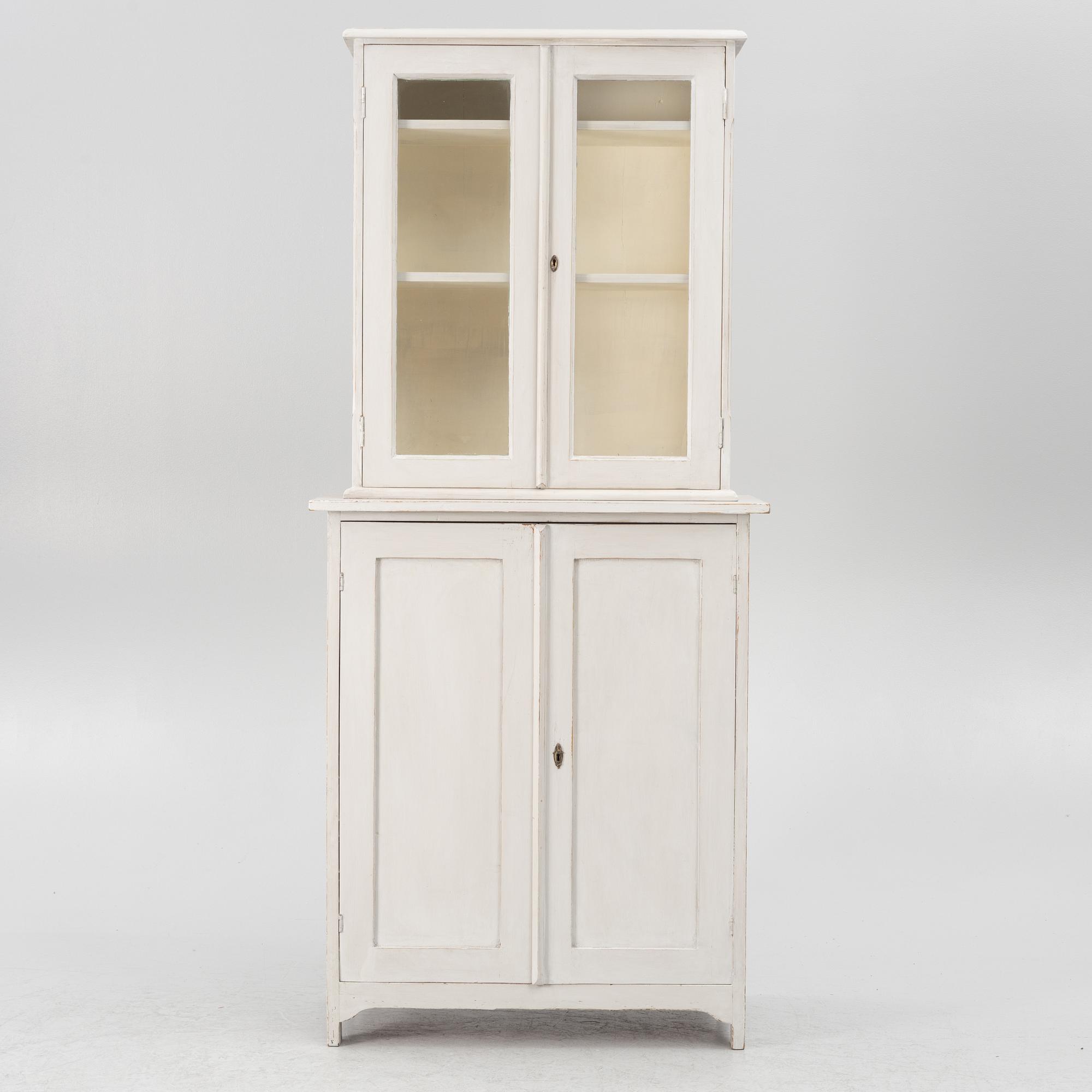 A vitrine cabinet, early 20th century.