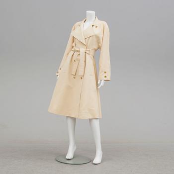 A trench-coat by Guy Laroche.