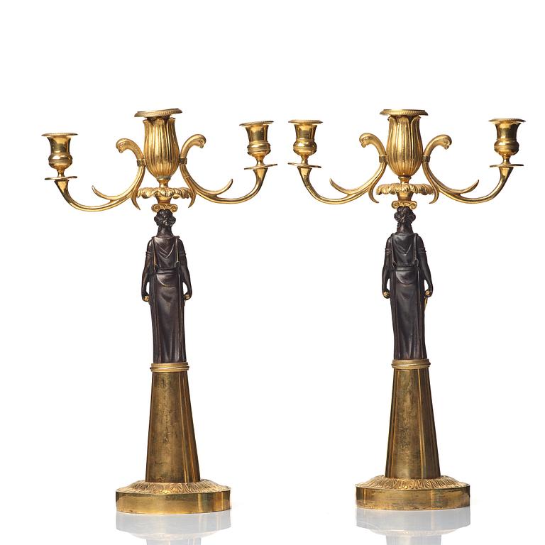 A pair of Empire 19th century three-light candelabra,  Russia.