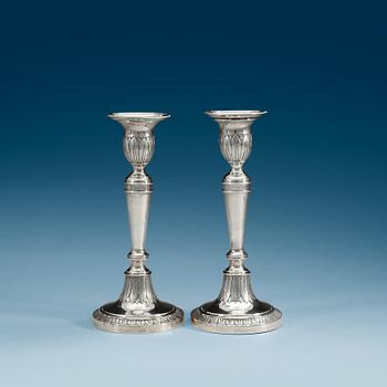 A pair of Russian early 19th century silver candlesticks, unidentified makers mark, Moscow 1807.