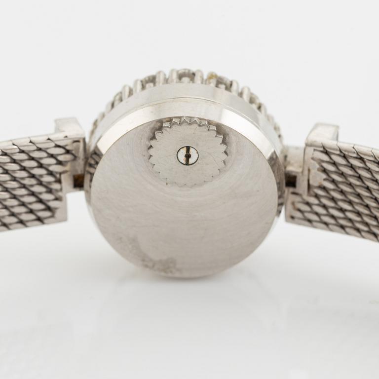 White gold, baguette- and brilliant cut diamond Corum ladies watch.