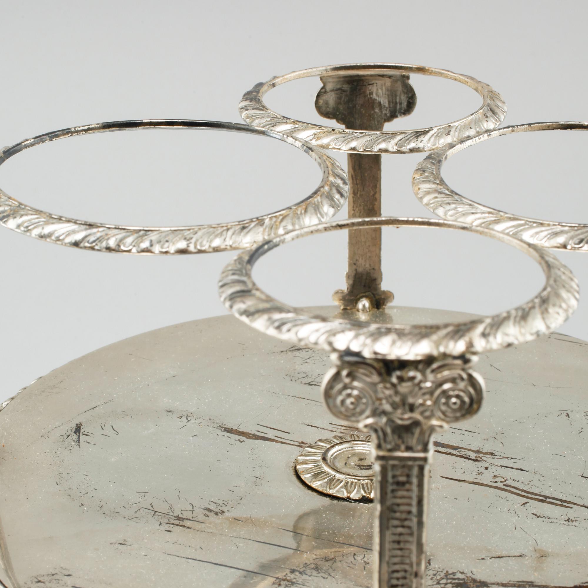 A silver bottle stand, by Gustaf Möllenborg (active 1823-1850), 1837. Weight 1236 g.