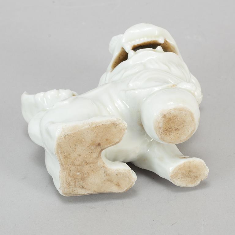 A Chinese blanc de chine figurine of a buddhist lion, 20th century.