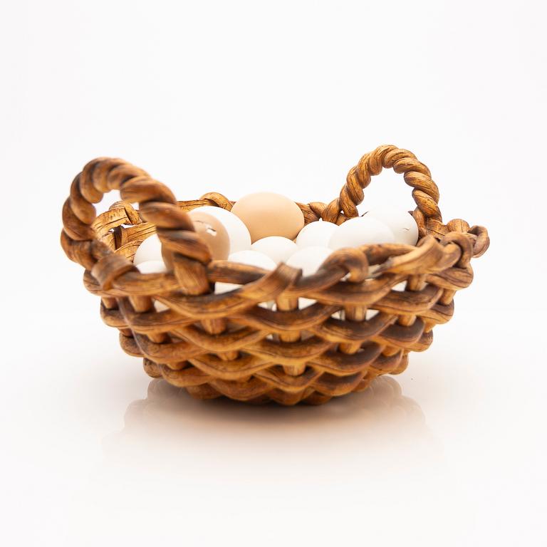 Ingrid Herrlin, basket with eggs, stoneware.