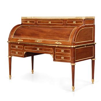 28. A Louis XVI-style mahogany and ormolu mounted 'bureau a cylindre', later part of the 19th century.