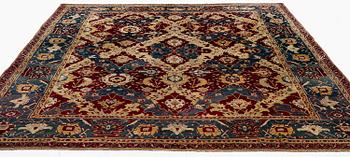 An Antique Agra carpet of 'Dragon Lattice' design, North India, 375 x 298 cm.
