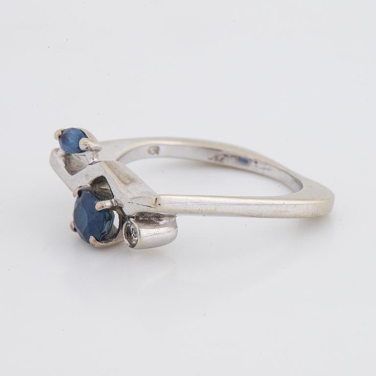 Navette and oval sapphire and diamond ring.