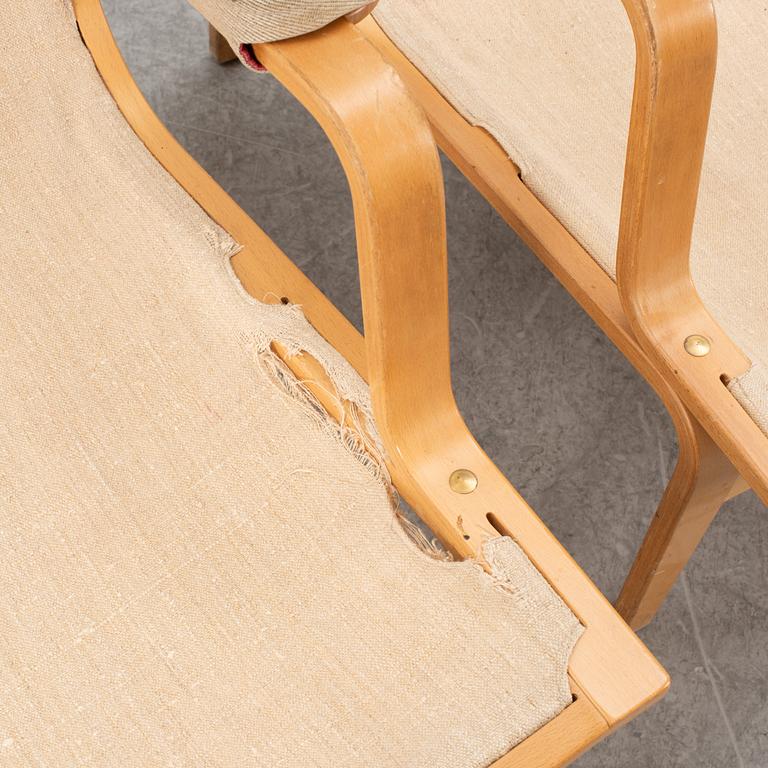 Bruno Mathsson, a pair of "Ingrid" armchairs, Dux, Sweden, second half of the 20th century.