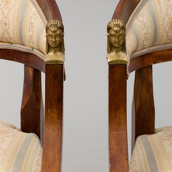 A pair of early 20th century late Gustavian style mahogany armchairs.