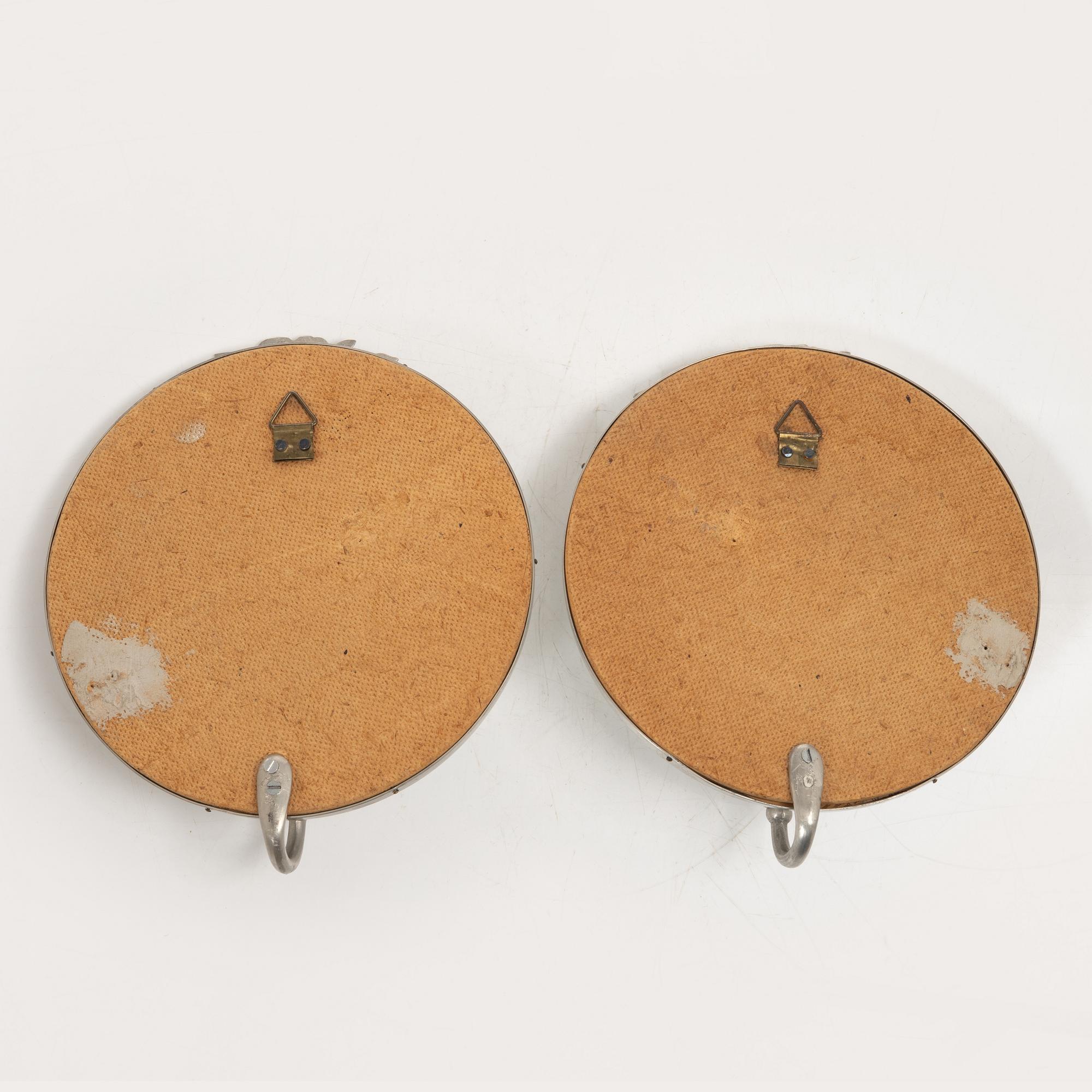 Mirror and a pair of wall sconces, 1920s/30s.