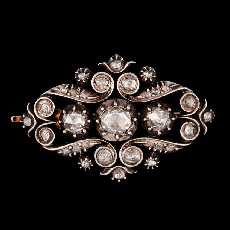A late Victorian rose-cut diamond brooch.