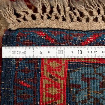 An antique Kuba rug, c. 128-133 x 103 cm.