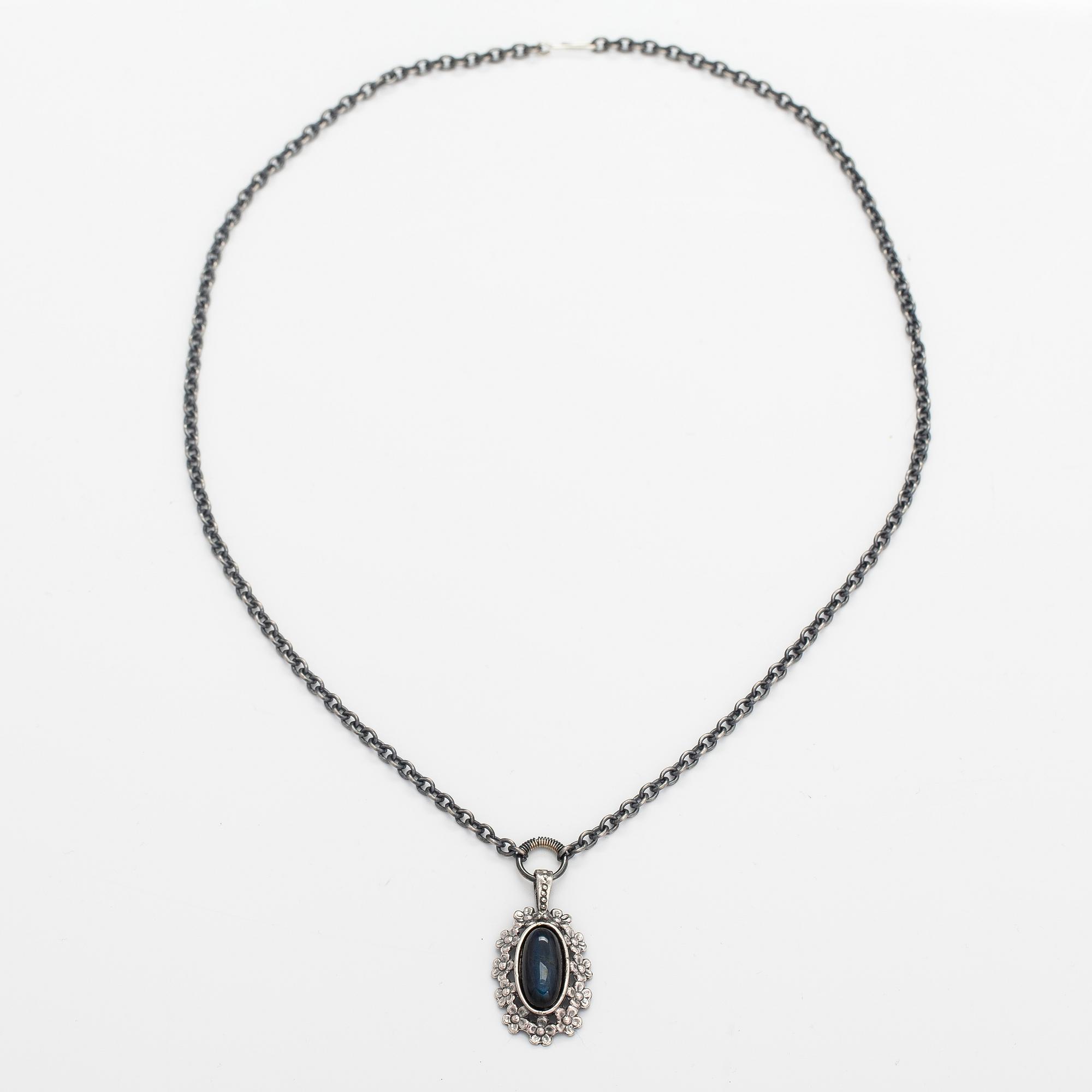 Jorma Laine, A silver necklace "Lemmikki" witha spectrolite. Turun Hopea, Turku.